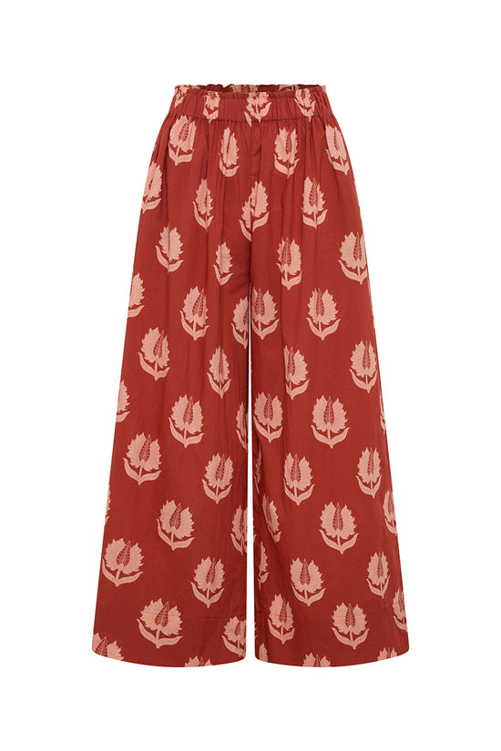 Ria Pants Ruby Red — ghost mannequin front view on white background, ruby red hand block print cotton wide-leg pants with botanical leaf motif, elastic waist, artisan Jaipur India | Daughters of India